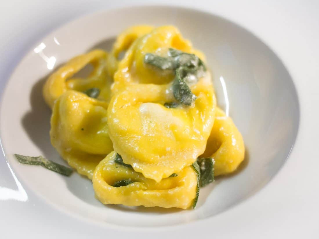 Tortelloni stuffed with ricotta and herbs in a sage and butter sauce at Oltre, Bologna, Italy