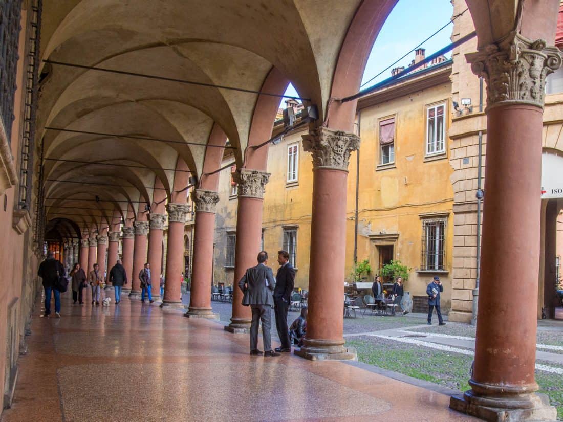 The portico along one side of Piazza Santo Stefano in Bologna, Italy