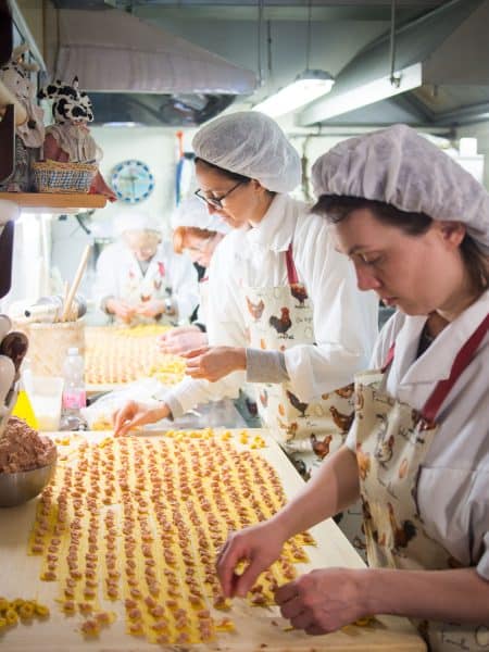 Tortellini pasta makers in Bologna, Italy
