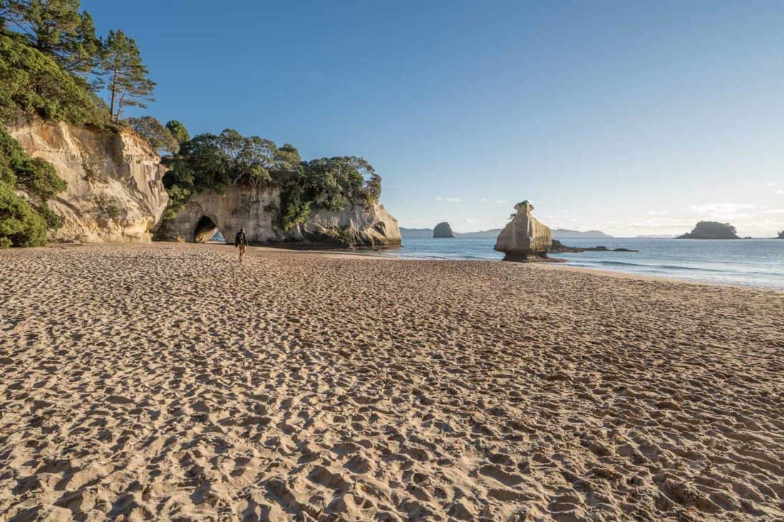 Simon walking along Mares Leg Cove looking towards Cathedral Cove