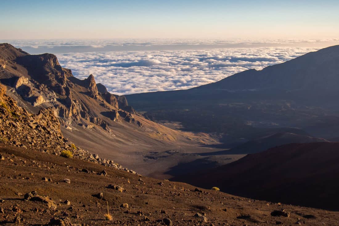 View of the sunrise above the clouds at Haleakala Crater, Maui, Hawaii, USA