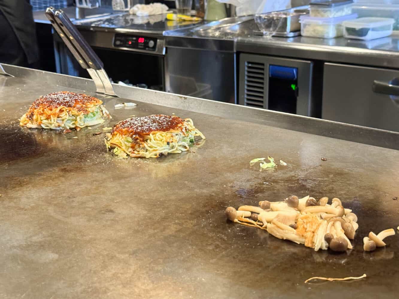Okonomiyaki cooked in front of you at Kamehameha in Kyoto
