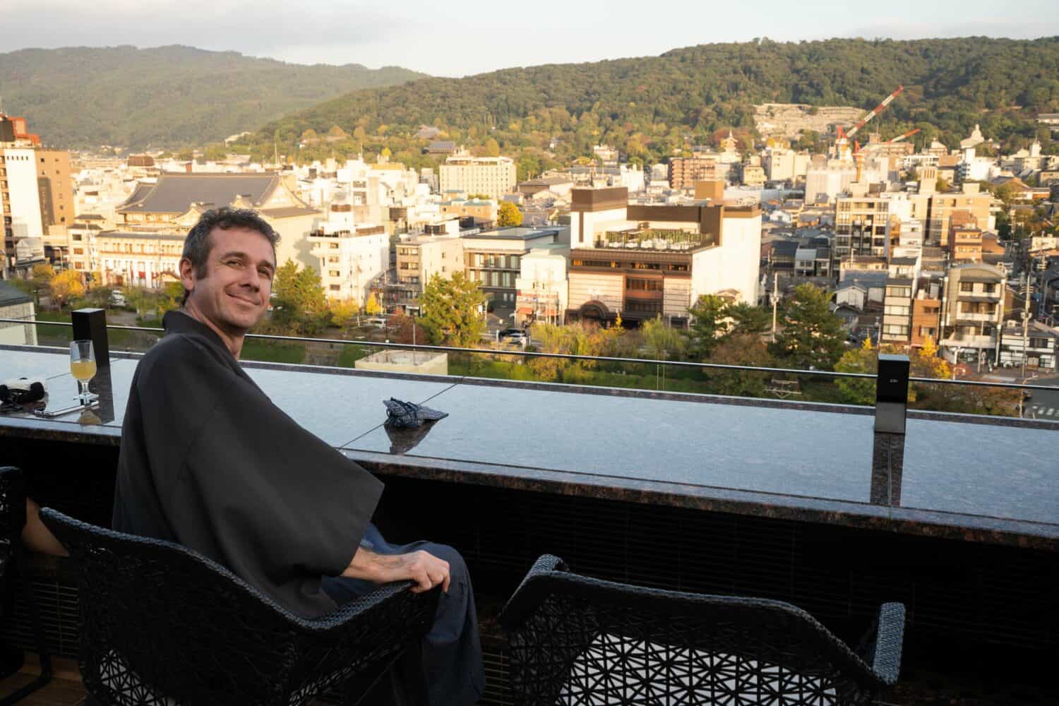 Simon relaxing on the rooftop of Sora Niwa Terrace Hotel, Kyoto, Japan