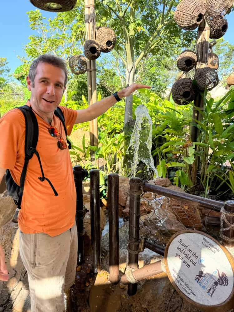 Simon making water move at Journey of Water, Inspired by Moana at Epcot