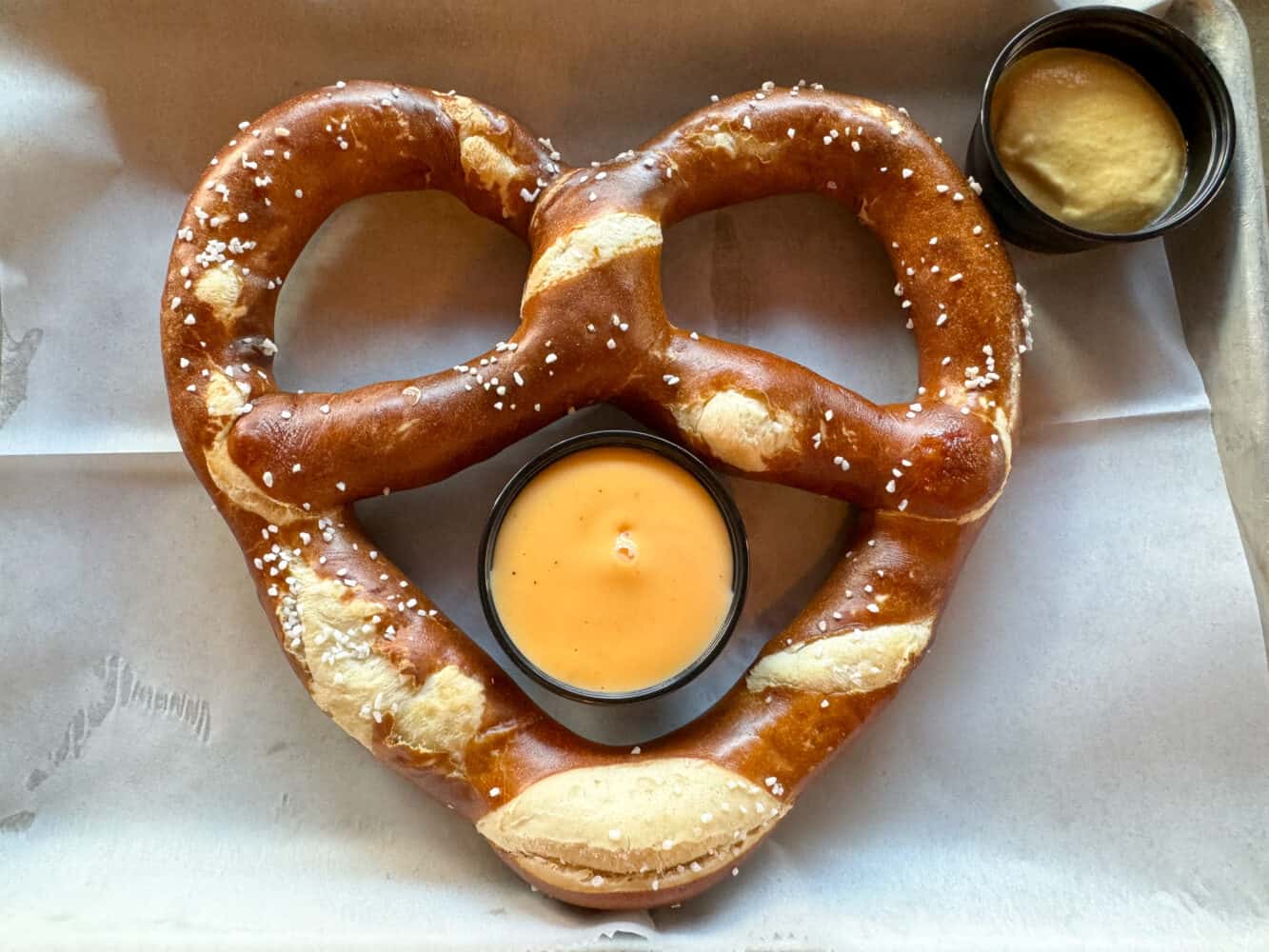 Bavarian pretzel with cheese sauce and mustard at Baseline Taphouse in Hollywood Studios, Disney World