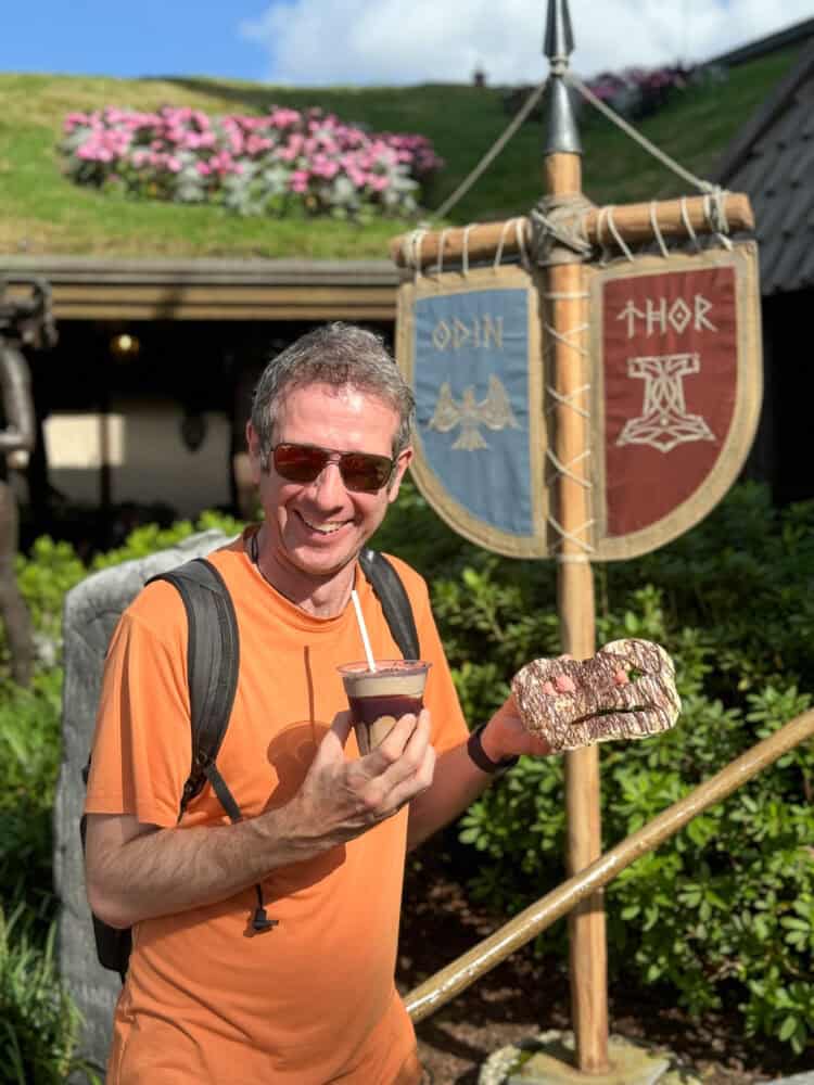 Simon with Viking coffee and chocolate Kringla in Norway pavilion at Epcot