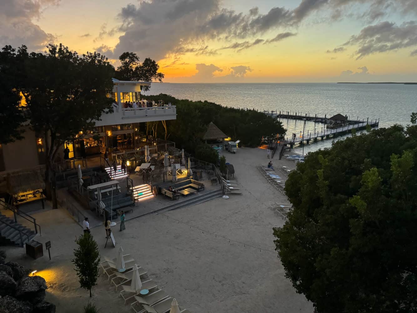 View from waterfront coconut wing room at night at Baker's Cay Resort