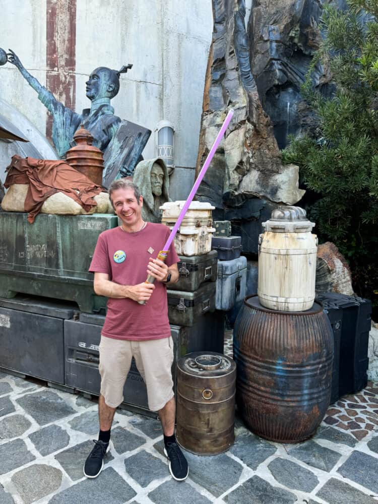 Simon with his lightsaber in Galaxy's Edge, Hollywood Studios, Disney World, Orlando