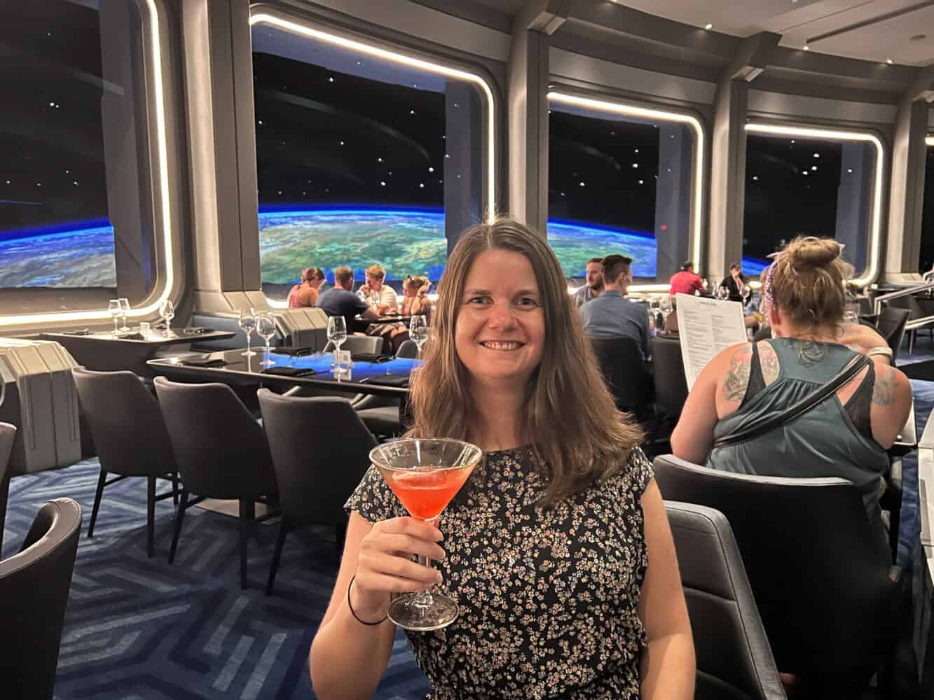 Erin enjoying a cocktail in space at Space 220, Epcot, Disney World, Orlando