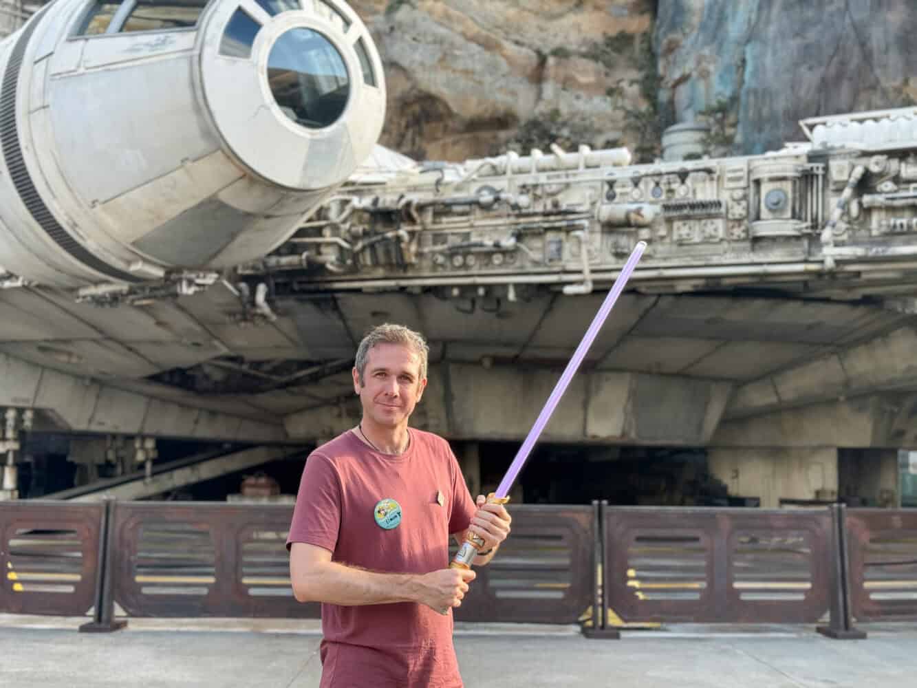 Simon wearing a Disney celebration pin for his birthday at the Millennium Falcon in Hollywood Studios