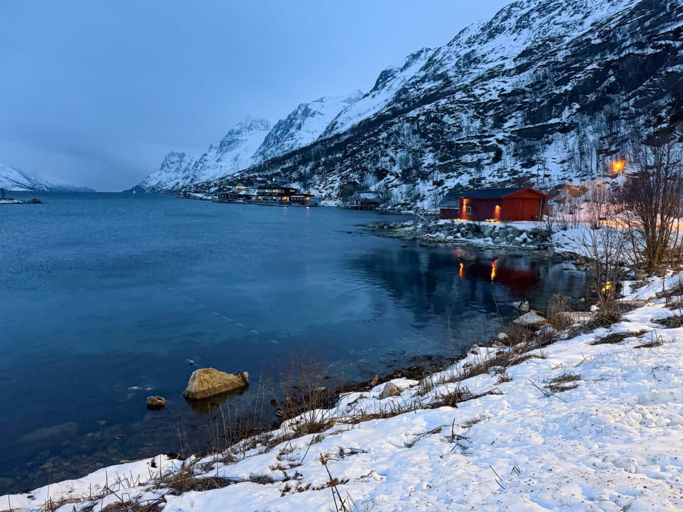 Ersfjordbotn village on Kvaloya in Norway in winter at dusk