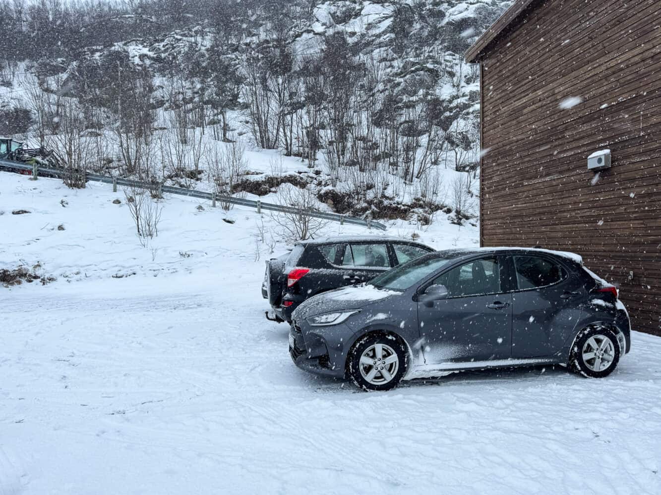 Our small rental car from Tromso on snowy roads in winter